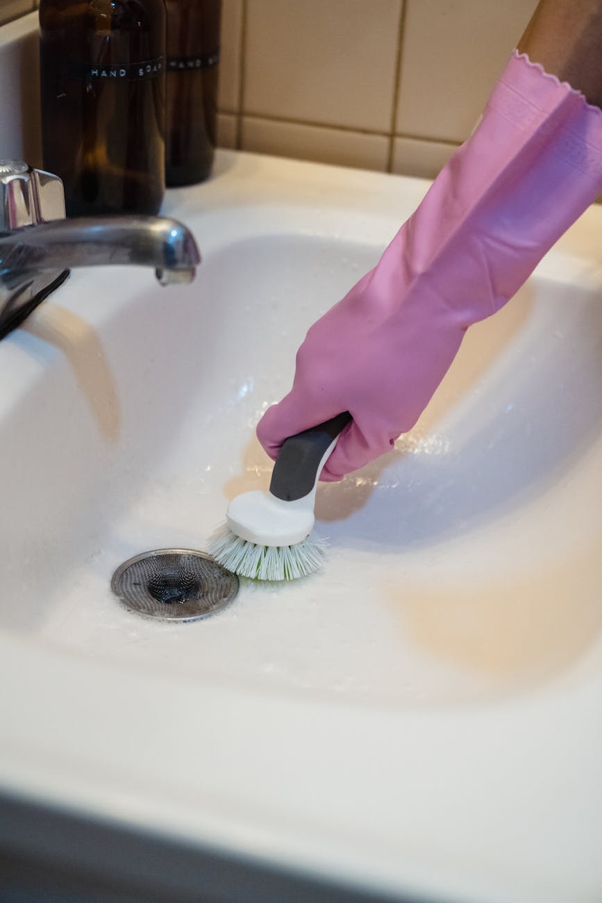 close up of cleaning the sink